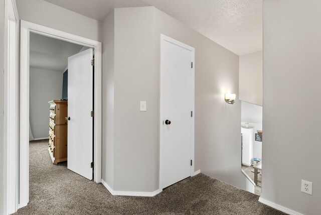 9805 N Jesse Ct, Spokane, WA 99208 - corridor featuring carpet flooring and baseboards
