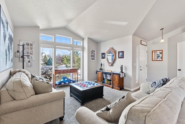 9805 N Jesse Ct, Spokane, WA 99208 - carpeted living area featuring vaulted ceiling and baseboards