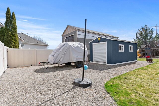 9805 N Jesse Ct, Spokane, WA 99208 - rear view of property with a storage shed