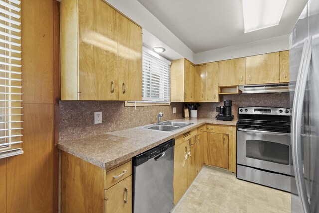 2620 S Pines Rd, Spokane Valley, WA 99206 - kitchen featuring stainless steel appliances, exhaust hood, backsplash, and light countertops