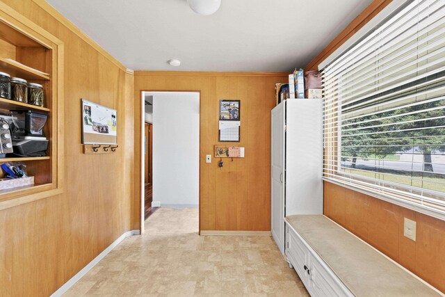 2620 S Pines Rd, Spokane Valley, WA 99206 - hallway featuring wood walls and baseboards