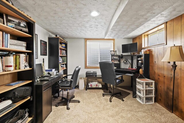 2620 S Pines Rd, Spokane Valley, WA 99206 - office featuring carpet flooring, wooden walls, and a textured ceiling