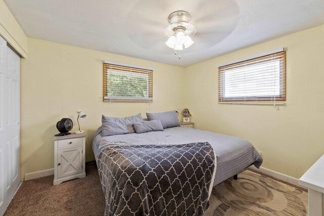 2620 S Pines Rd, Spokane Valley, WA 99206 - bedroom featuring a closet, carpet floors, and a ceiling fan