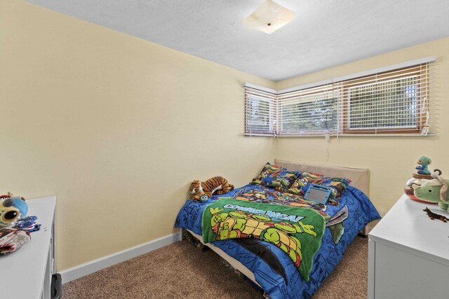 2620 S Pines Rd, Spokane Valley, WA 99206 - carpeted bedroom with baseboards