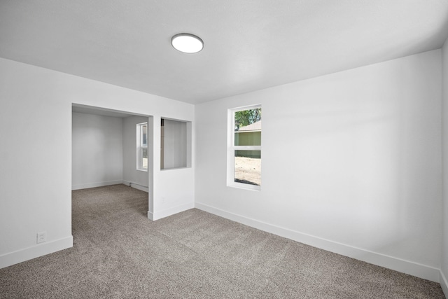 1608 W Maxwell Ave, Spokane, WA 99201 - empty room featuring carpet and baseboards
