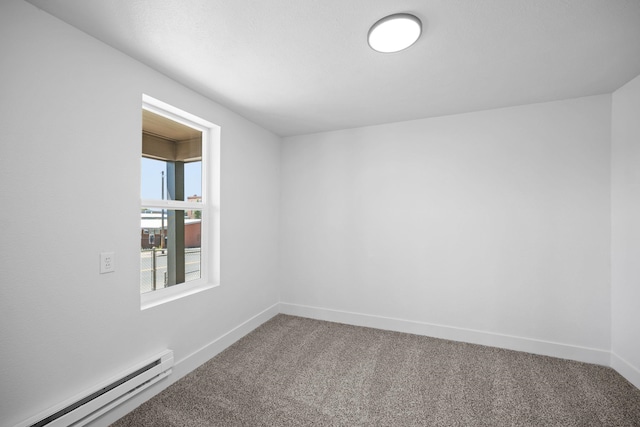 1608 W Maxwell Ave, Spokane, WA 99201 - carpeted spare room with a baseboard heating unit and baseboards