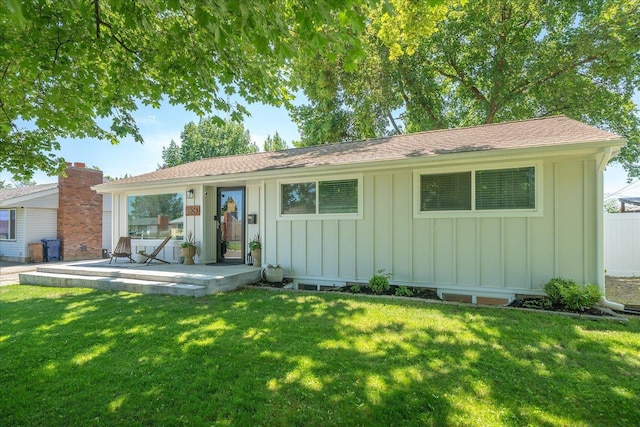 2804 E 39th Ave, Spokane, WA 99223 - ranch-style home featuring board and batten siding, a front yard, and a shingled roof