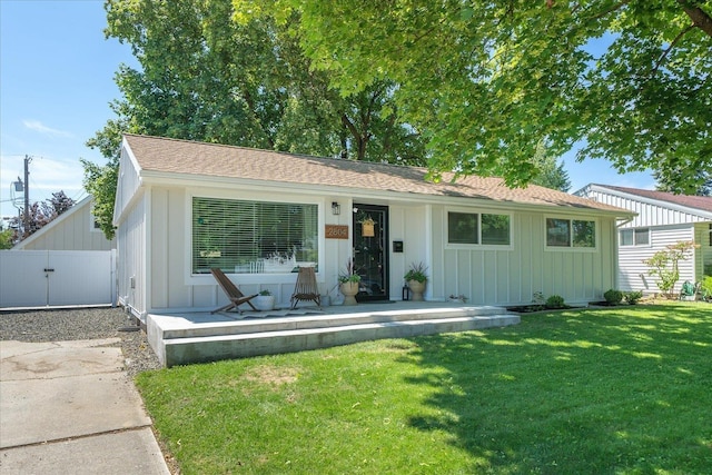 2804 E 39th Ave, Spokane, WA 99223 - ranch-style house featuring board and batten siding, covered porch, and roof with shingles