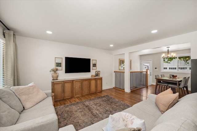 2804 E 39th Ave, Spokane, WA 99223 - living room featuring a chandelier, wood finished floors, and recessed lighting
