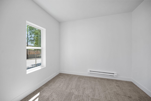 1509 N Maple St, Spokane, WA 99201 - carpeted spare room with a baseboard radiator and baseboards