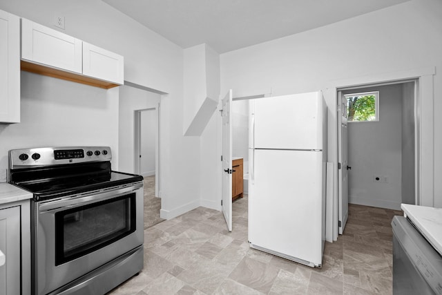 1507 N Maple St, Spokane, WA 99201 - kitchen featuring stainless steel appliances and white cabinets
