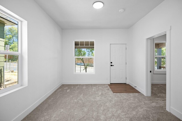 1507 N Maple St, Spokane, WA 99201 - spare room featuring carpet floors and a smoke detector