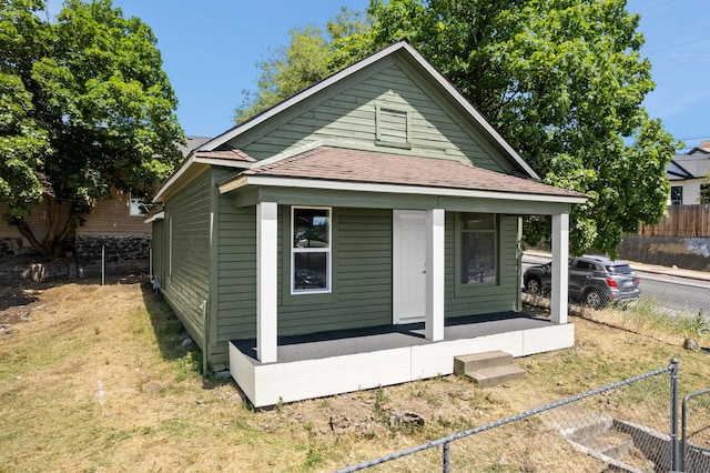 1604 W Maxwell Ave, Spokane, WA 99201 - back of property featuring a porch and roof with shingles