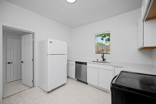 1604 W Maxwell Ave, Spokane, WA 99201 - kitchen with freestanding refrigerator, dishwasher, black range with electric cooktop, light countertops, and white cabinets