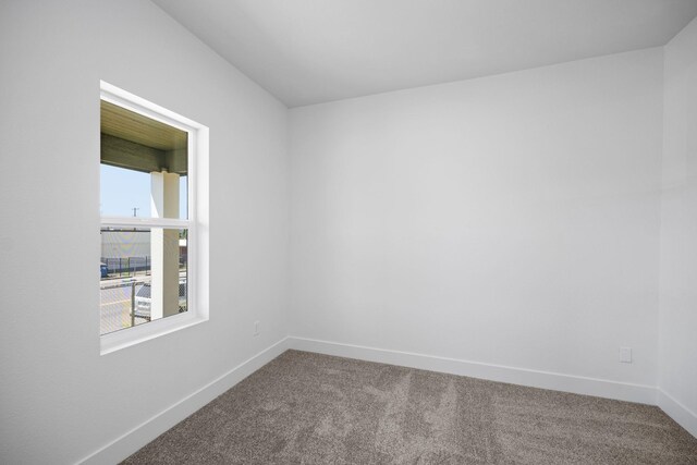 1604 W Maxwell Ave, Spokane, WA 99201 - carpeted empty room featuring baseboards