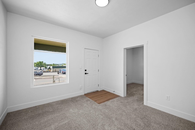 1604 W Maxwell Ave, Spokane, WA 99201 - carpeted empty room featuring baseboards