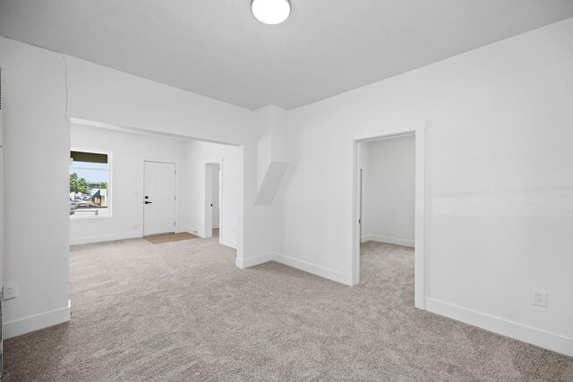1604 W Maxwell Ave, Spokane, WA 99201 - empty room featuring carpet flooring and baseboards
