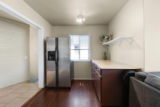 10021 N Whittier St, Spokane, WA 99218 - kitchen with stainless steel refrigerator with ice dispenser, open shelves, dark wood-style flooring, and light countertops