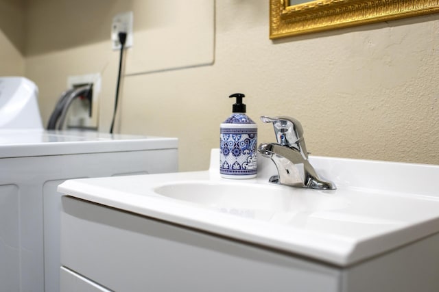 10021 N Whittier St, Spokane, WA 99218 - bathroom view of vanity and washer and clothes dryer