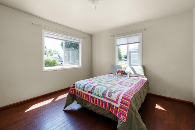 10021 N Whittier St, Spokane, WA 99218 - bedroom featuring multiple windows and hardwood / wood-style flooring