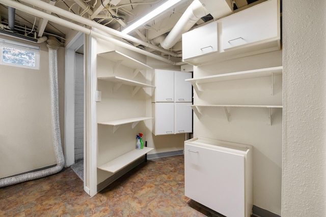 10021 N Whittier St, Spokane, WA 99218 - walk in closet featuring stone finish floors