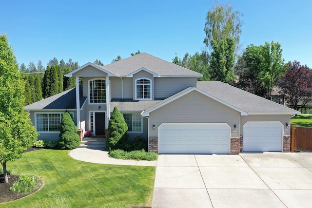 5522 E Cargill Ln, Colbert, WA 99005 - traditional-style house featuring a garage, driveway, a front lawn, and roof with shingles