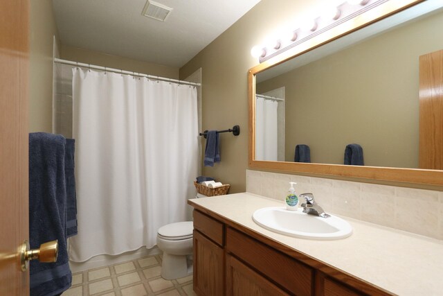 5522 E Cargill Ln, Colbert, WA 99005 - full bath featuring tile patterned floors, decorative backsplash, and vanity