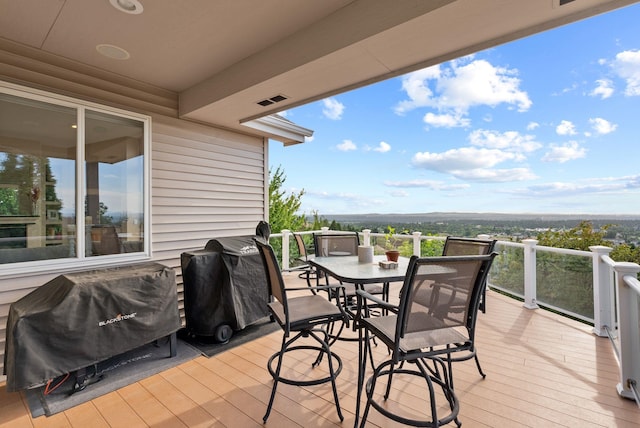 5506 S Southview Ln, Spokane, WA 99223 - wooden deck with grilling area and outdoor dining area
