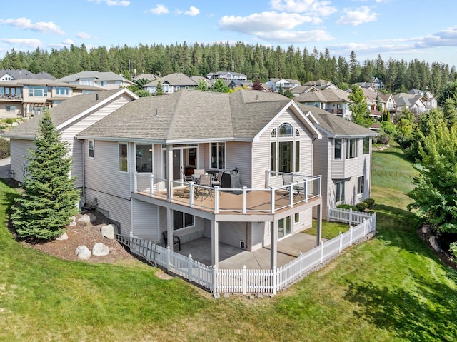 5506 S Southview Ln, Spokane, WA 99223 - rear view of property with a residential view, a shingled roof, a patio, and a fenced backyard
