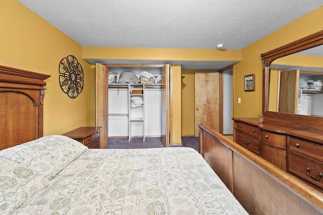 7905 W Seven Mile Rd, Nine Mile Falls, WA 99026 - carpeted bedroom with a textured ceiling and a closet