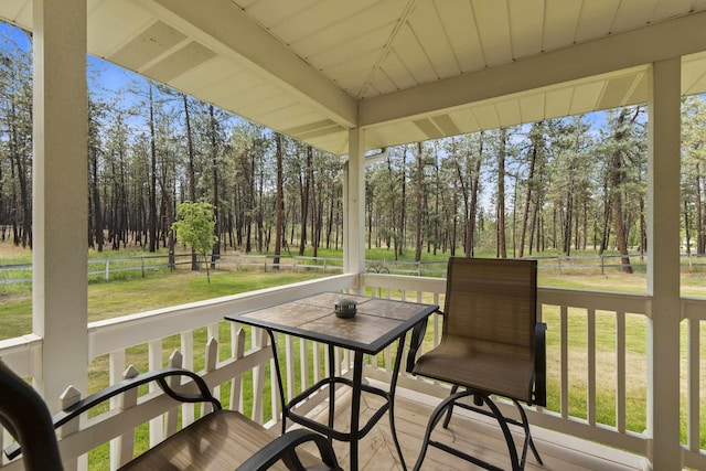 7905 W Seven Mile Rd, Nine Mile Falls, WA 99026 - wooden terrace featuring view of wooded area