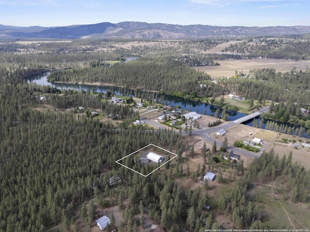 7905 W Seven Mile Rd, Nine Mile Falls, WA 99026 - view of property location with a water and mountain view and property parcel outlined