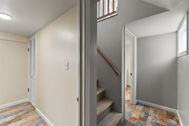 561 E Forest Ave, Colville, WA 99114 - stairs featuring stone tile flooring and baseboards