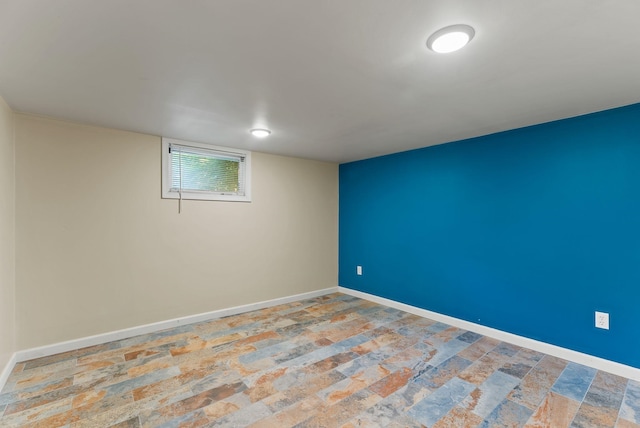 561 E Forest Ave, Colville, WA 99114 - spare room featuring baseboards