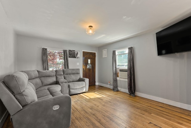 561 E Forest Ave, Colville, WA 99114 - living area with cooling unit and wood-type flooring