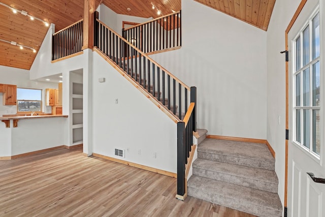 5011B Mason Rd, Clayton, WA 99110 - stairway featuring wood ceiling, wood finished floors, high vaulted ceiling, and rail lighting