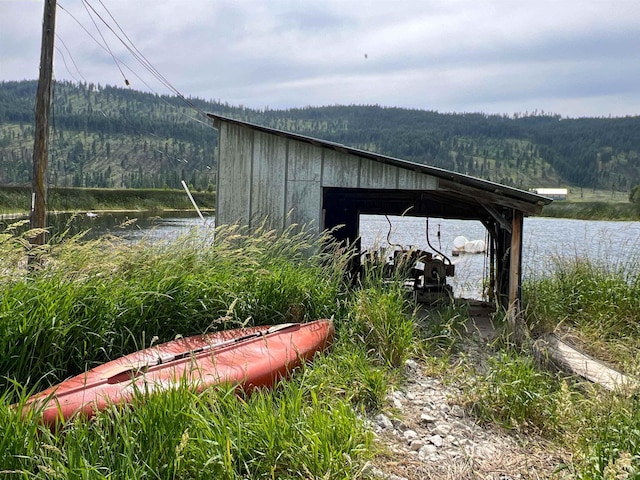 820 Echo Stub Rd, Colville, WA 99114 - view of outbuilding featuring a wooded view and a water view