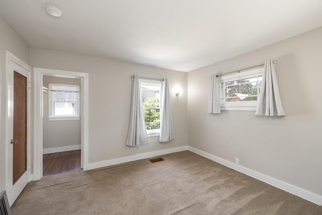 530 W Gordon Ave Unit 013, Spokane, WA 99205 - empty room featuring carpet floors and baseboards