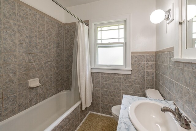 530 W Gordon Ave Unit 013, Spokane, WA 99205 - bathroom with tile walls, tiled shower / bath, and vanity