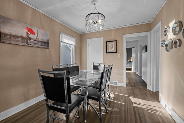 824 E E 38th Ave, Spokane, WA 99203 - dining room featuring wood finished floors, crown molding, and a chandelier