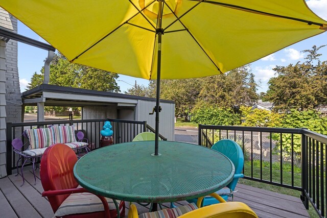 824 E E 38th Ave, Spokane, WA 99203 - wooden terrace featuring outdoor dining area