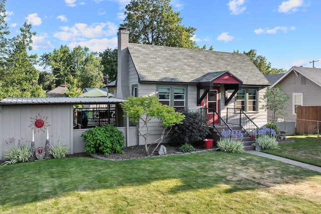 824 E E 38th Ave, Spokane, WA 99203 - view of front of home featuring a chimney