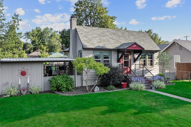 824 E E 38th Ave, Spokane, WA 99203 - view of front facade with a chimney