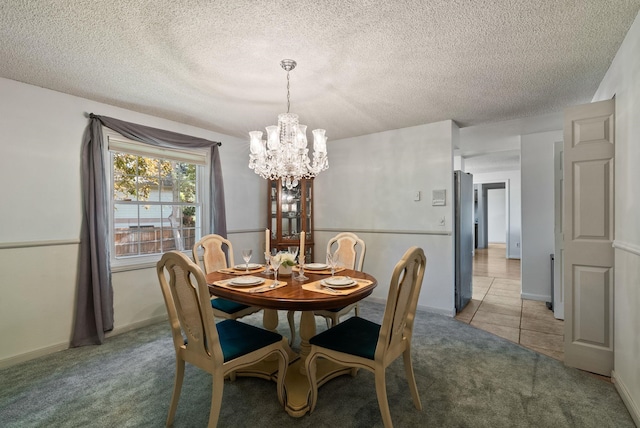 11628 N Galahad Dr, Spokane, WA 99218 - dining room featuring a chandelier, light colored carpet, a textured ceiling, and light tile patterned flooring