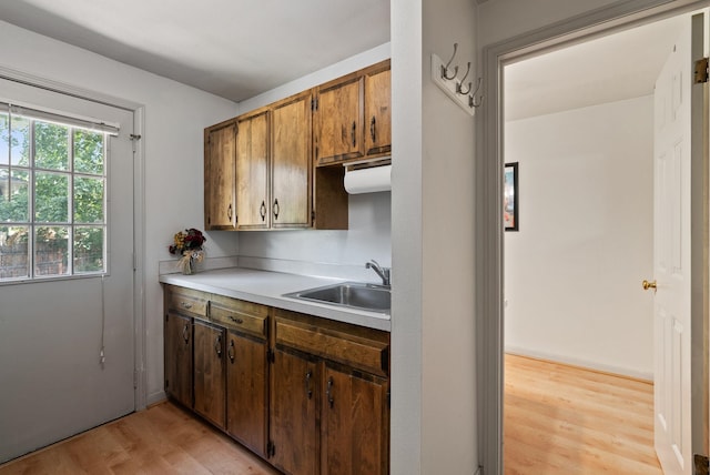 11628 N Galahad Dr, Spokane, WA 99218 - kitchen with light wood finished floors and light countertops