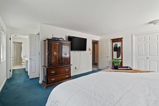 11628 N Galahad Dr, Spokane, WA 99218 - bedroom featuring dark carpet and a closet