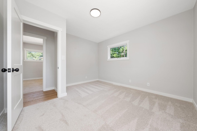 2917 W Dalton Ave, Spokane, WA 99205 - unfurnished bedroom featuring carpet and multiple windows