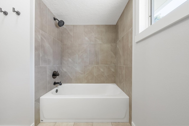 2917 W Dalton Ave, Spokane, WA 99205 - bathroom featuring tile patterned floors, shower / bathtub combination, and a textured ceiling