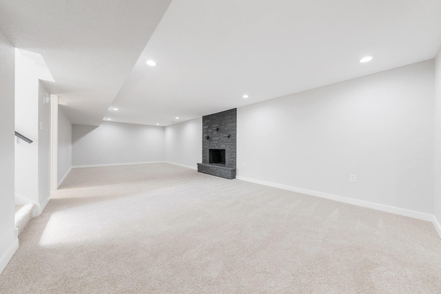 2917 W Dalton Ave, Spokane, WA 99205 - unfurnished living room with light carpet, a fireplace, and recessed lighting