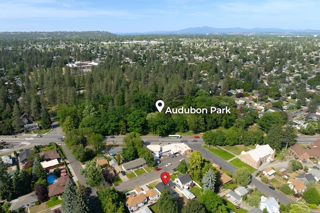 2917 W Dalton Ave, Spokane, WA 99205 - aerial view of property's location with mountains and nearby suburban area